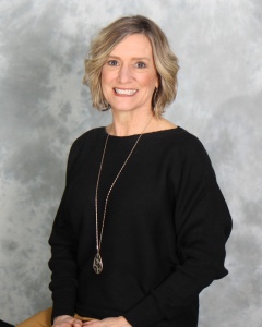 A professional photograph of Cindy Phipps.