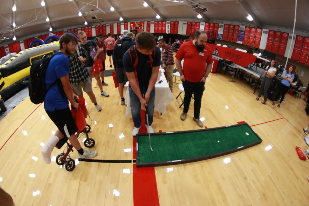 Students putting golf