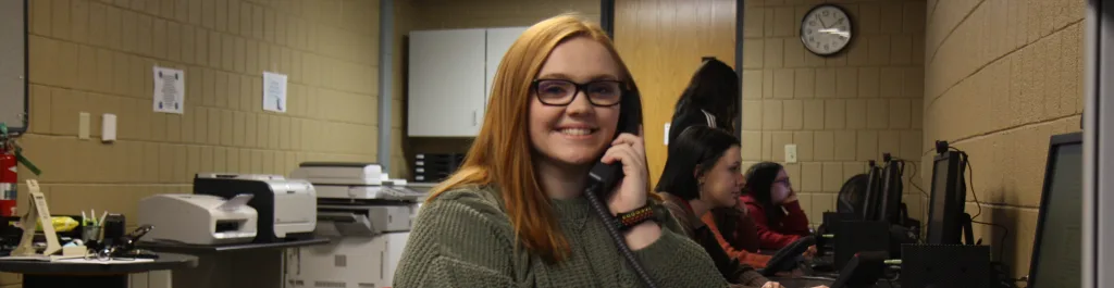Photo of student in business setting