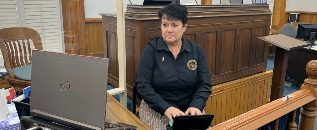 Court reporter working in court room