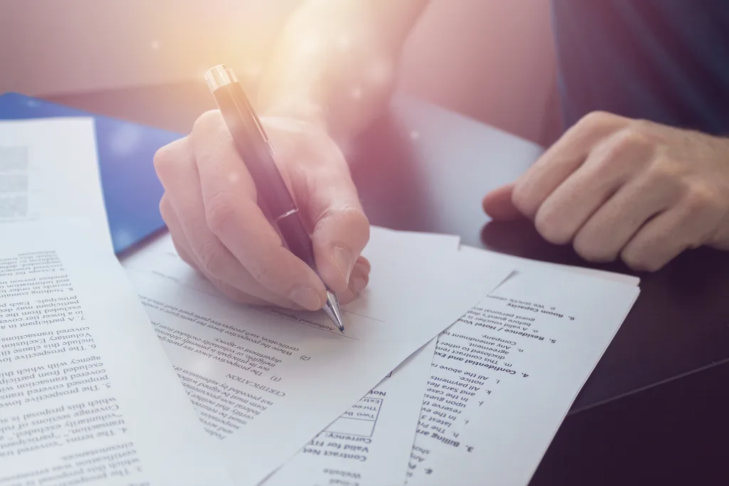 Photo of someone filling out a form