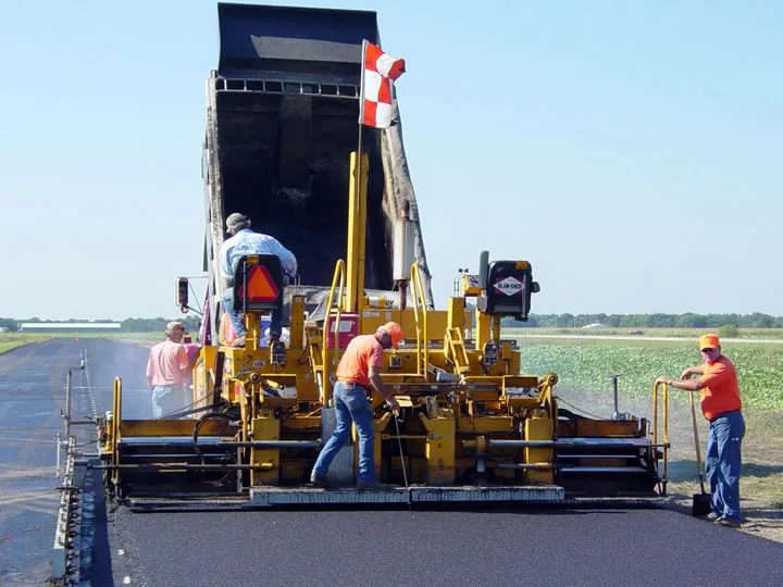 Students working with IDOT Asphalt