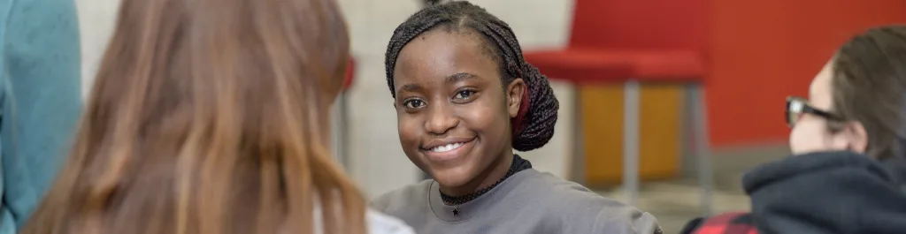 Photo of student smiling at camera