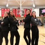 A group of Lake Land College student ambassadors in the field house for Laker Visit Day.