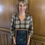 Lake Land College Business Instructor Lisa Earp pictured with the IBEA Post-Secondary Educator of the Year Award