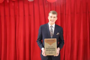 Ag student Jay Bliler receives the 2025-2026 Overall Outstanding Agriculture Student Award.