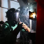 An image of a high school student completing a weld during the first-ever Lake Land College Laker Connect Welding Competition