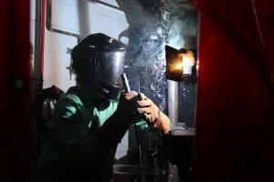 An image of a high school student completing a weld during the first-ever Lake Land College Laker Connect Welding Competition