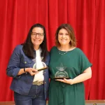 Dean for Workforce Solutions & Community Education Christine Strohl and Senior Designer & Brand Coordinator Megan Nelson receiving the 2026 Lake Land College Shine Award during the College’s annual employee recognition event.