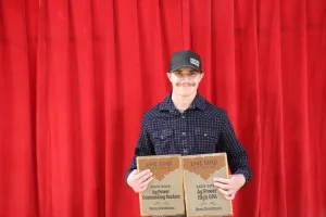 Ag student Beau Doedtman receiving the 2025-2026 Ag Power Outstanding Student Award and Ag Power High GPA Award.