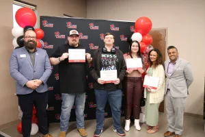 TRIO Staff Members recognizing the students nominated for the TRIO Perseverance Award during the annual TRO SSS Banquet. 