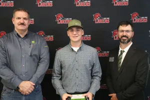 A John Deere Tech graduate being recognized during the annual graduation ceremony.