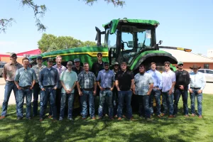 A group photo of the 2026 Lake Land College John Deere Tech graduates
