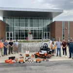 Representatives of Stihl and Graber Building Supply Donating equipment to Lake Land College's Grounds team