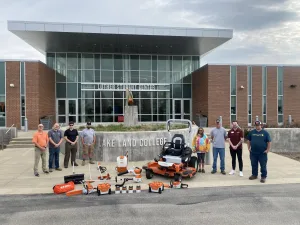 Representatives of Stihl and Graber Building Supply Donating equipment to Lake Land College's Grounds team