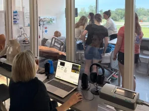 A group of nurses caring for a robotic patient in Lake Land's high-fidelity nursing simulation lab in Effingham.