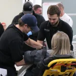 Lake Land College Emergency Medical Services (EMS) students completing a mock patient care exam.