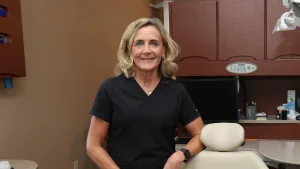 A Lake Land College dental hygiene alumna at the private dental practice she now owns.