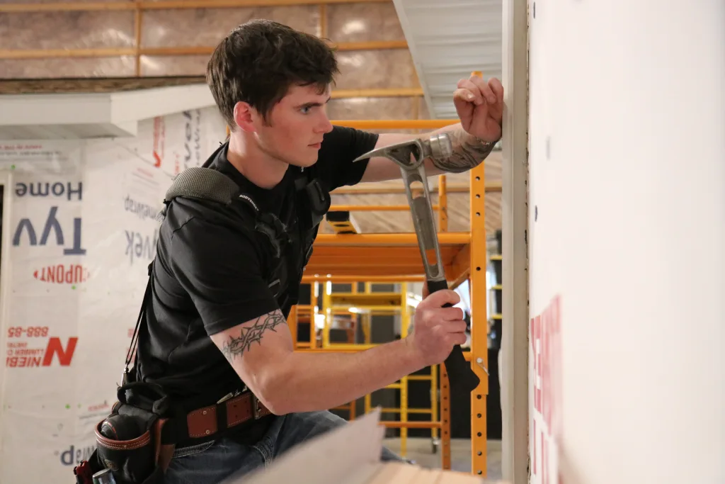 A student working on a construction project.
