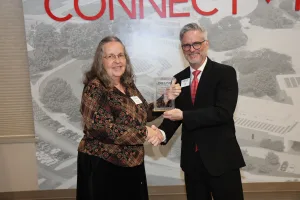 A Lake Land College retiree accepting an award during the College's annual Foundation & Alumni Awards Ceremony.