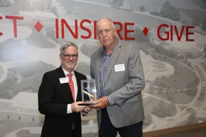 A Lake Land College retiree accepting an award at the College's annual Foundation & Alumni awards ceremony.